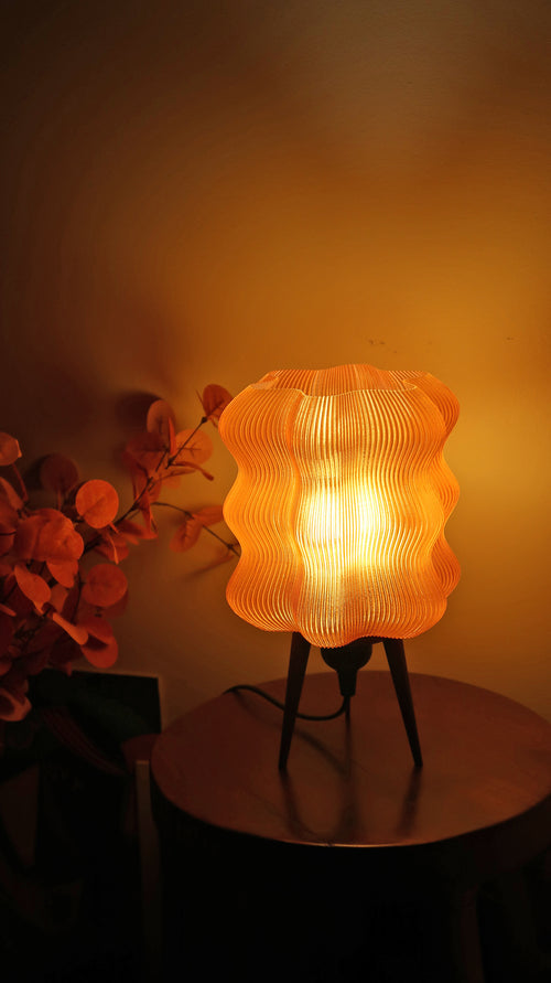 Lampe design ondulée orange foncé scintillant