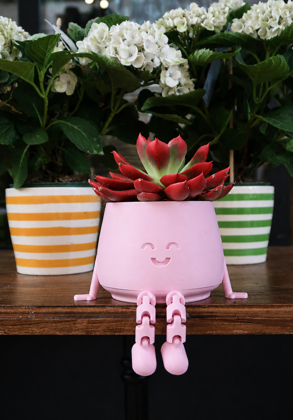 Jardinière à jambes articulées