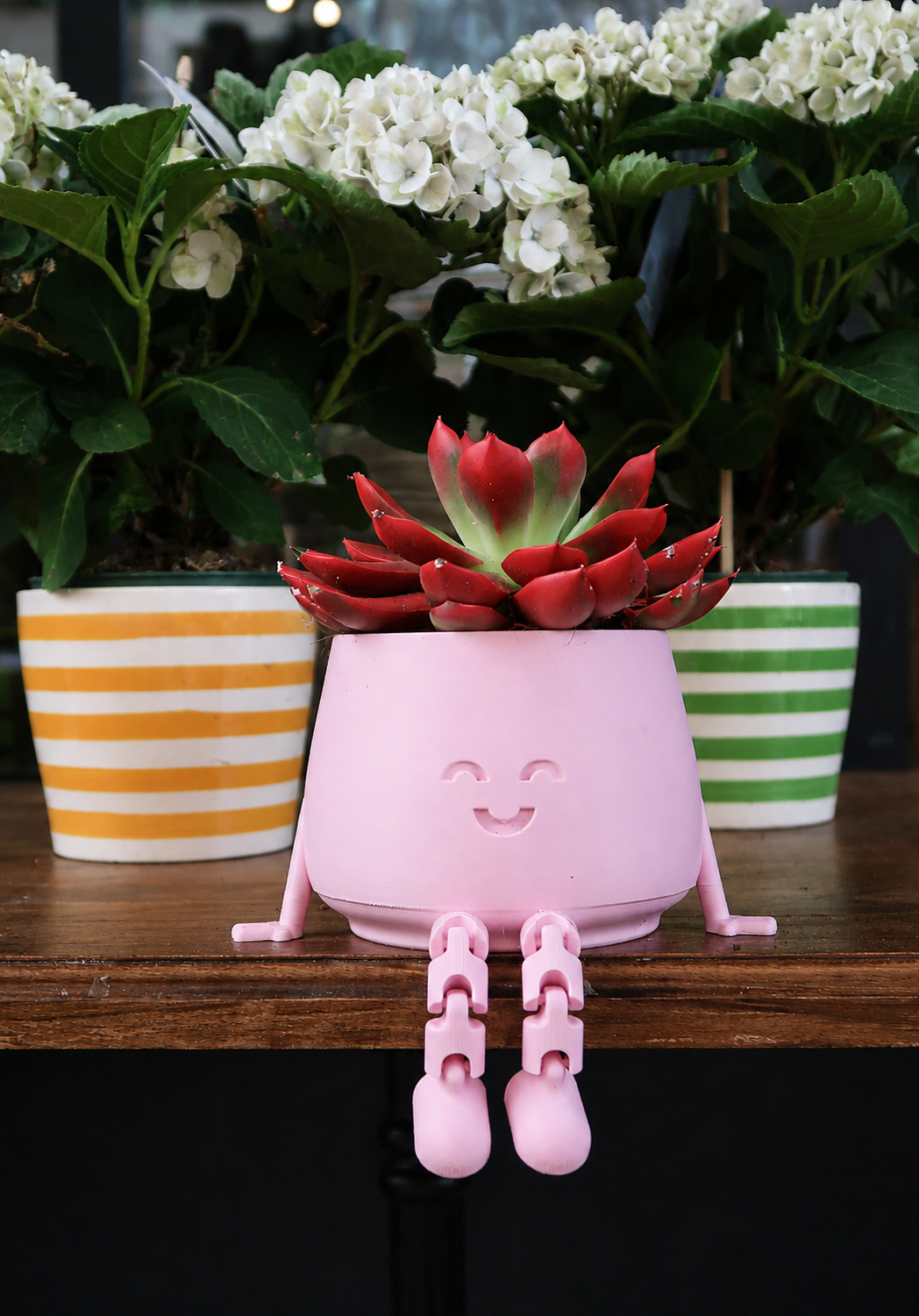 Jardinière à jambes articulées